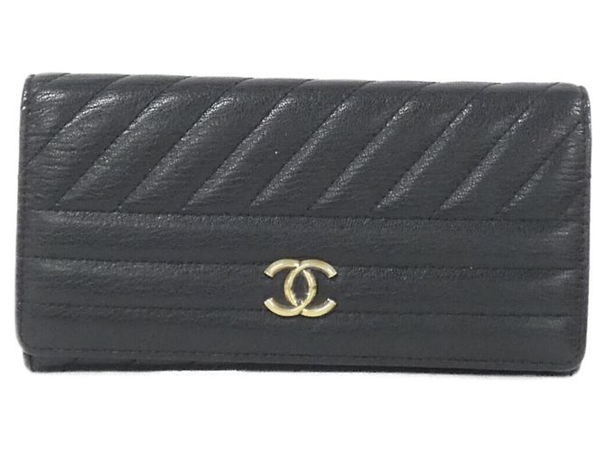 Cartera bi-fold Chanel 82399 de cuero negro