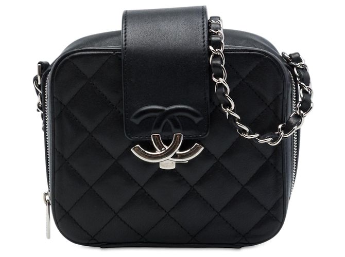 Borsa Camera Box Chanel Mini in pelle di agnello matelassé nera con CC Nero