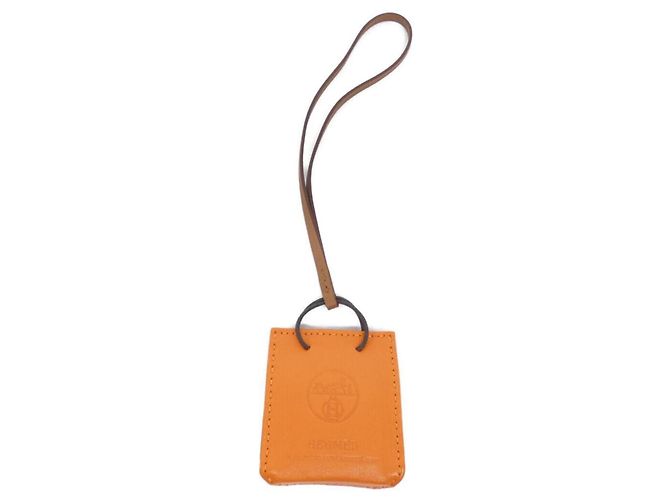 Charm per borsa Hermès Rosso Oro Agneau Milo D'oro