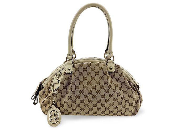 Gucci Sukey GG Canvas com couro Medium