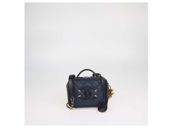Chanel Piccola borsa vanity in pelle caviar matelassé blu navy e nera Nero