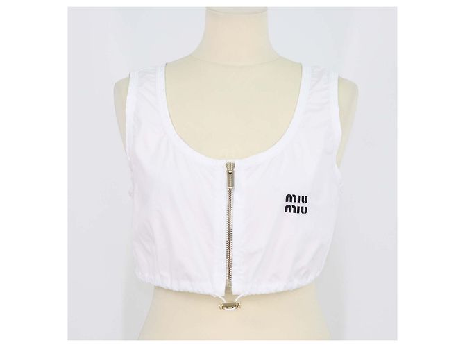 Top corto Miu Miu de algodón blanco con cremallera frontal y cordón