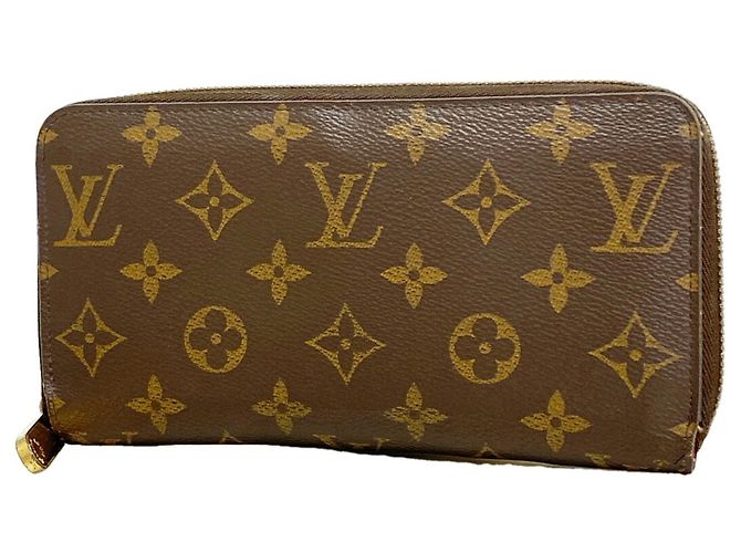 Cartera Zippy Monogram Louis Vuitton Castaño Fucsia