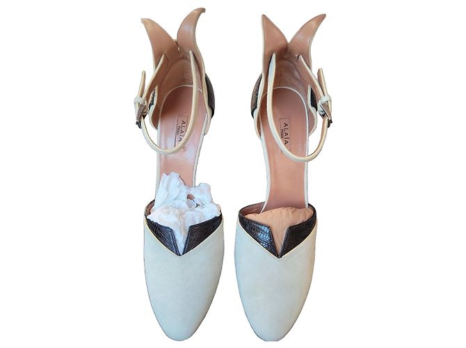 Alaïa leather and suede pumps Black White Beige