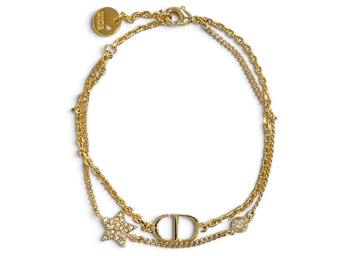 Pulsera de dijes de oro Christian Dior Dorado