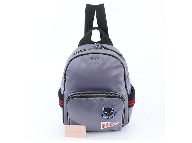 Miu Miu blauer Rucksack mit Katzen-Applikation