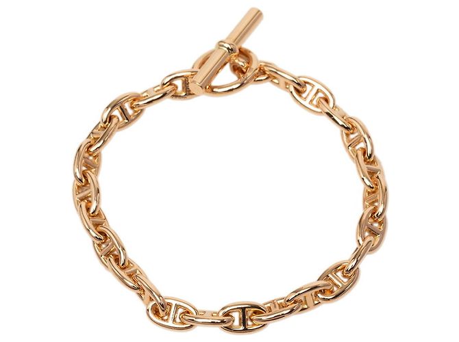 Hermès Pulsera con dije Hermes Pink Gold Dorado