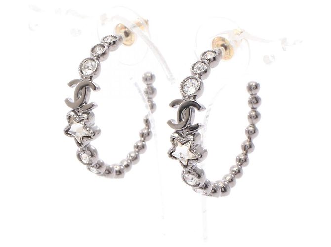 Pendientes de aro Chanel Coco Mark Star Plata