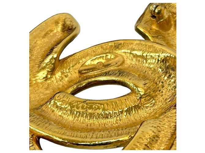 Broche Chanel Coco Mark Dourado