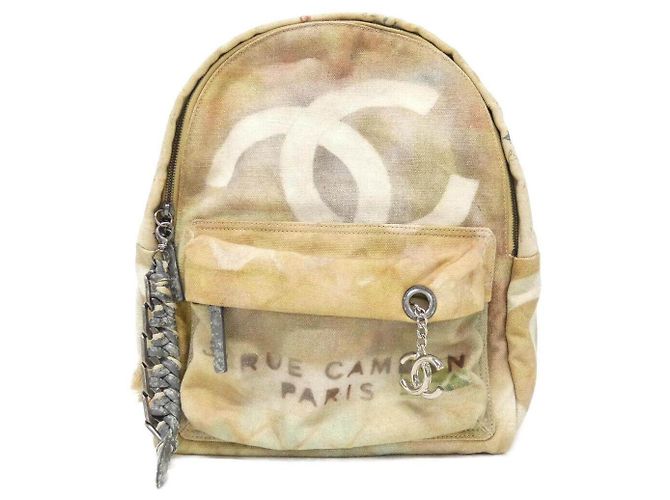 Mochila Chanel em lona Bege
