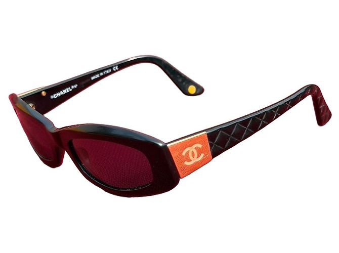 Occhiali da sole Chanel neri logo CC arancione Nero