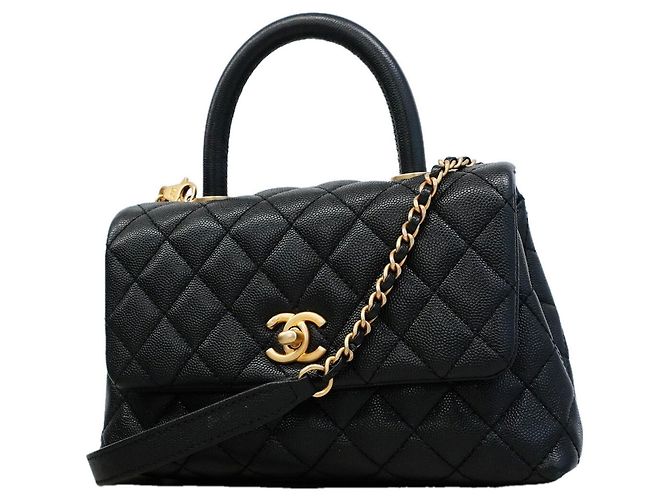 Coco Handle Chanel Handtasche aus schwarzem genarbtem Kalbsleder