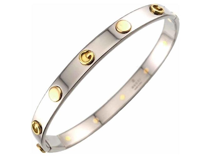 Bangles Gucci G in oro giallo 18K e acciaio inossidabile