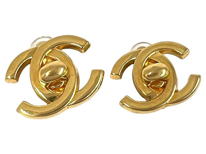 Orecchini CHANEL Vintage motivo Coco Mark Turnlock D'oro