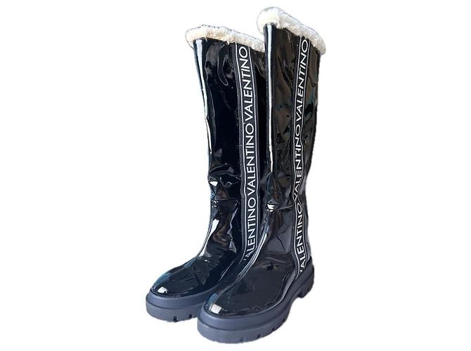Botas altas Valentino de vinilo negro charol