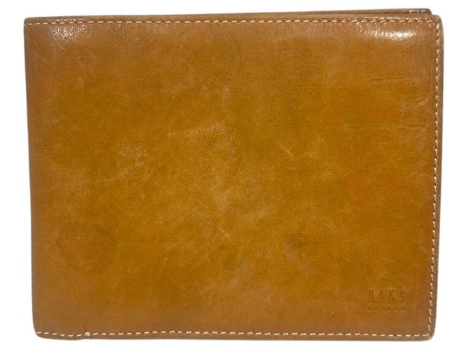 Autre Marque Cartera bifold de cuero DAKS Castaño