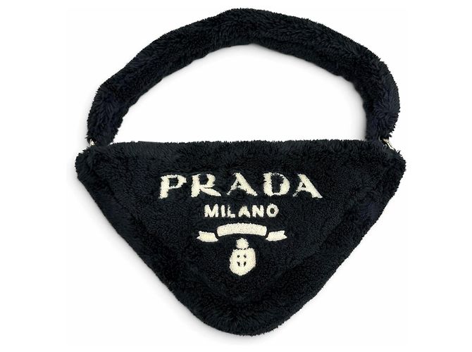 Borsa Prada in spugna blu navy con logo triangolare
