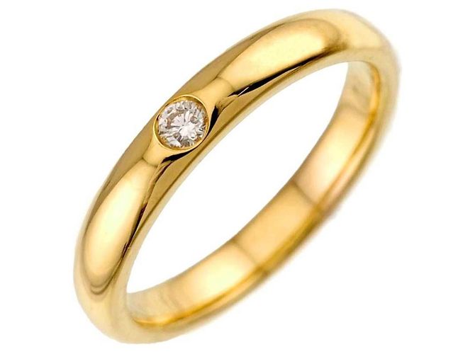 Anillo banda Harry Winston en oro amarillo de 18K