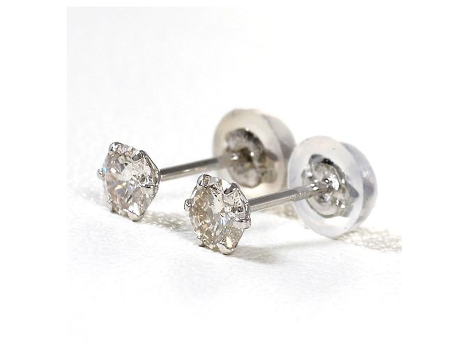 Autre Marque Pendientes de botón de platino PT900 con diamantes