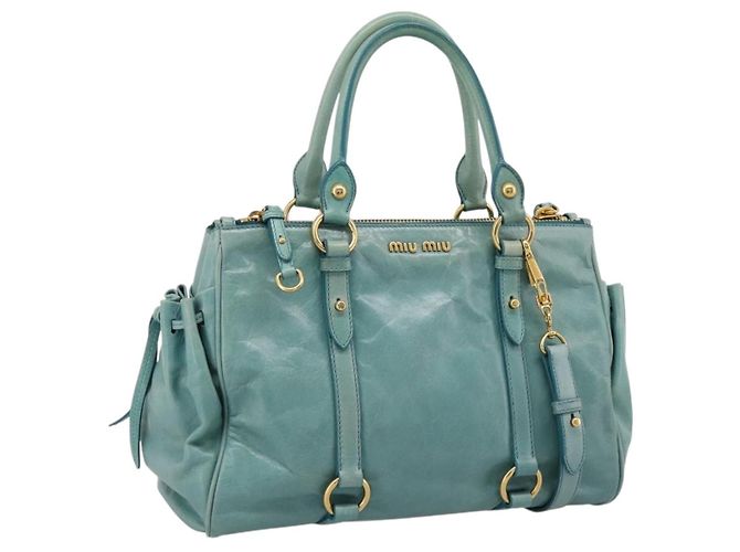 Bolsa de mão Miu Miu em couro 2way azul tom dourado Auth 206643V
