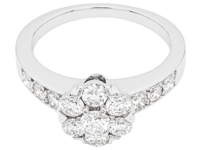 Van Cleef & Arpels Ring, "Fleurette", white gold and diamonds.