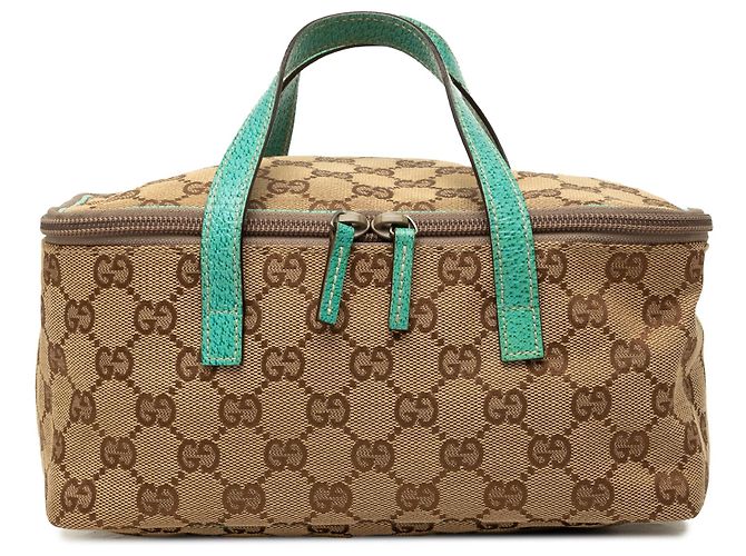 Bolsa Vanity Gucci GG Canvas bege
