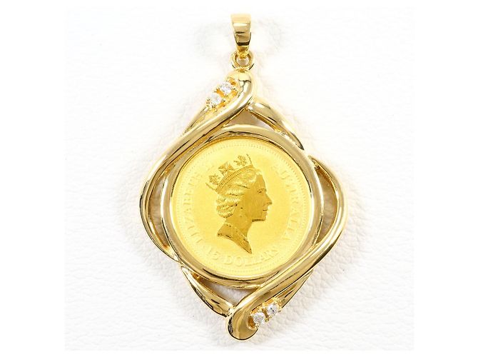 Autre Marque Pendente elegante in oro giallo 18K e 24K e diamanti D'oro