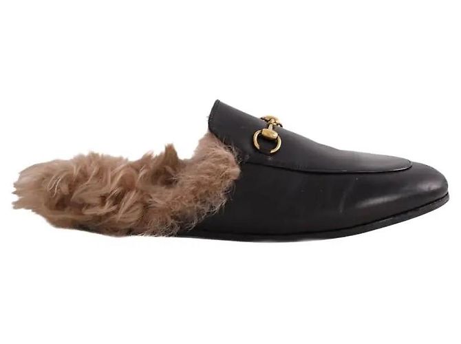 Mules Gucci em couro preto