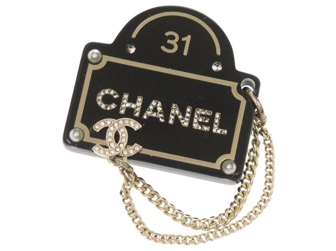 Broche Chanel Coco Mark em pérolas falsas e pedras Preto Dourado