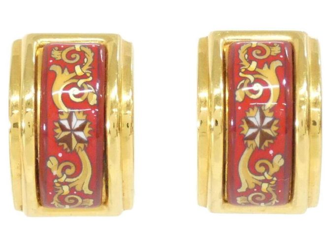 Hermès Orecchini a clip Hermes in oro e rosso D'oro
