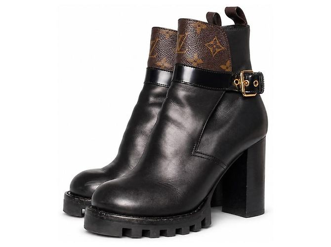 Louis Vuitton, botas de cano curto com fivela star trail Marrom Preto