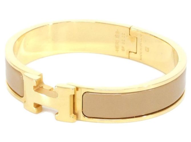 Hermès Pulseira Charm Hermes Click H PM Bege Dourado