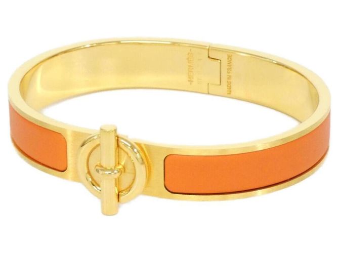 Hermès Pulsera Charm Hermes Click Glenan Dorado Naranja