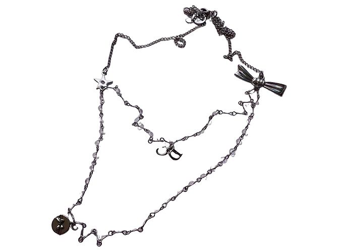 Autre Marque Collana Dior in metallo argentato con pendenti stella, fiocco e CD Argento