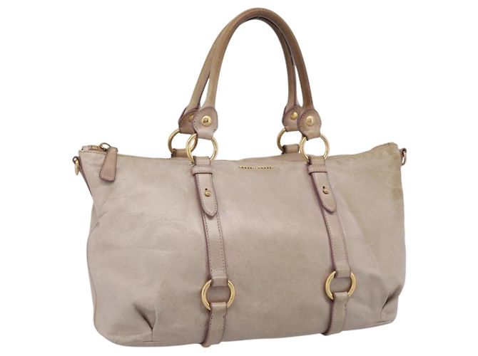 Bolsa de mão Miu Miu em couro bege tom dourado Auth 167653