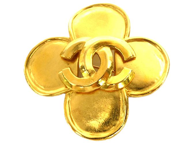 Broche fleur Chanel CC plaquée or doré