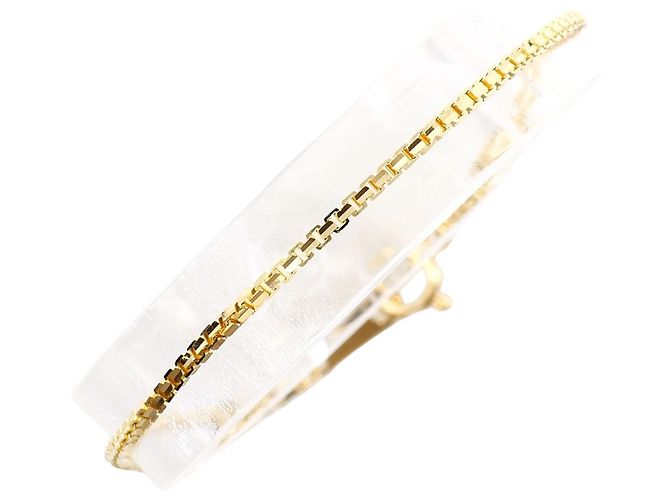 Autre Marque Pulsera de dijes en oro amarillo de 18K Dorado