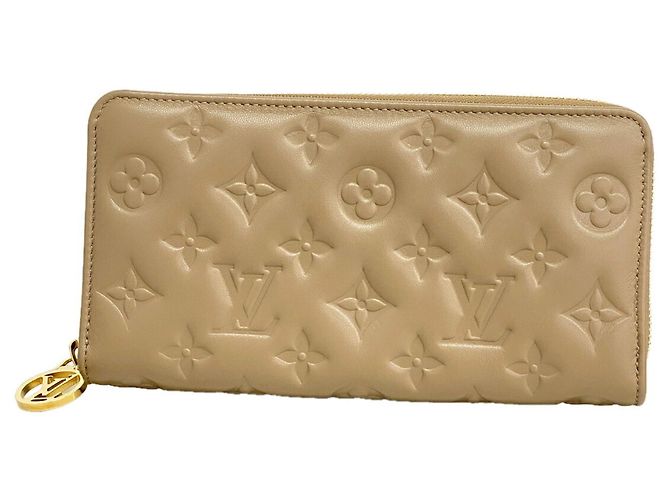 Louis Vuitton Monogram Embossed Zippy Wallet Taupe