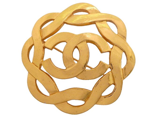 Spilla Chanel placcata oro D'oro