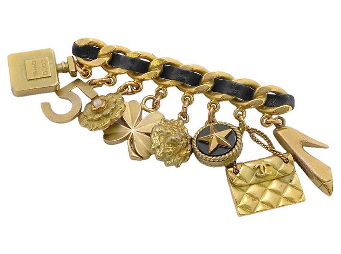 Broche Chanel - Coco Mark Camellia Icon Noir Doré