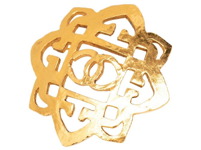 Broche Chanel Coco Mark chapado en oro Dorado