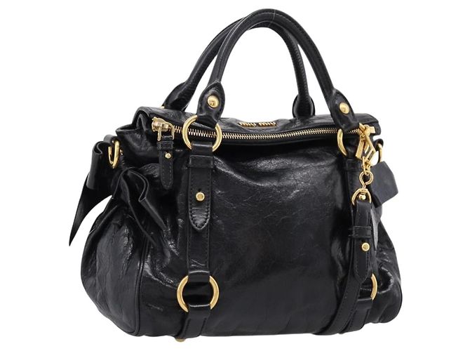 Sac à main Miu Miu en cuir 2 voies noir ton or Auth 167724SAM