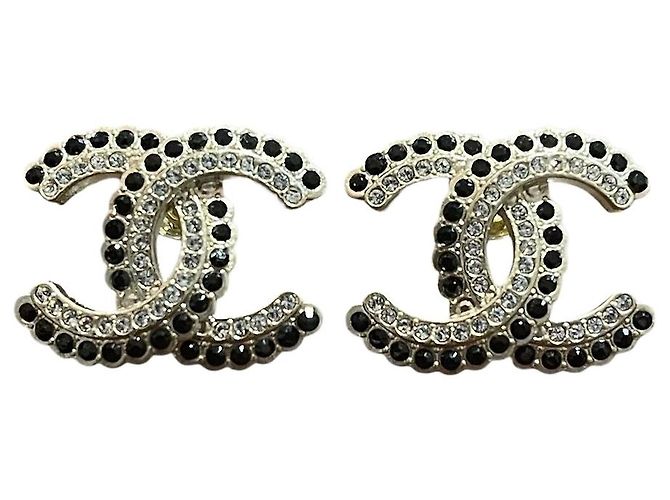 Boucles d'oreilles Chanel CC noires Doré