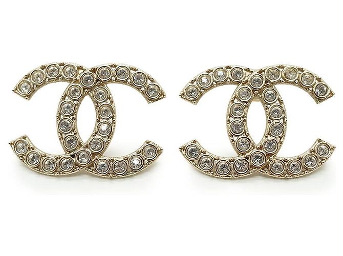 Boucles d'oreilles Chanel CC Crystal dorées Blanc
