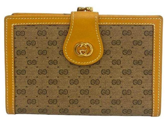 Portafoglio bi-fold in pelle Gucci Old Micro GG Logo Hardware Marrone