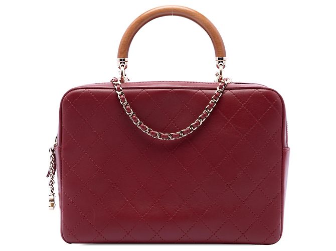 mala Chanel Knock On Wood em pele de cordeiro acolchoada vermelha com pega superior Vermelho