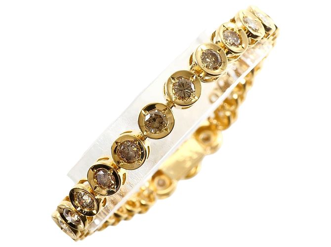 Autre Marque Pulsera de amuletos en oro amarillo 18K con diamantes marrones Castaño Dorado