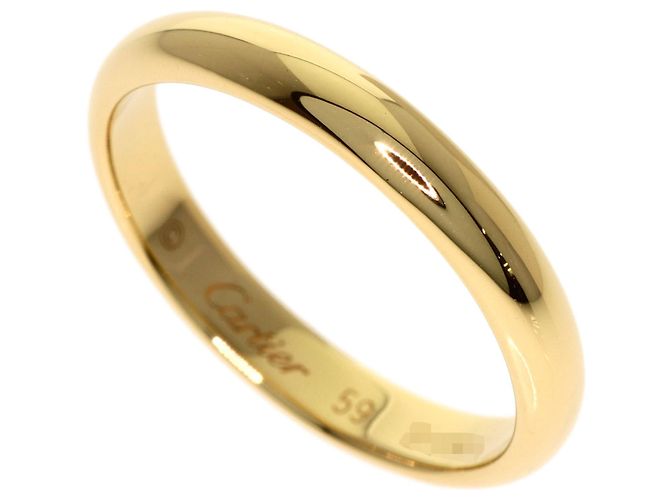 Bague anneau Cartier en or jaune 18K