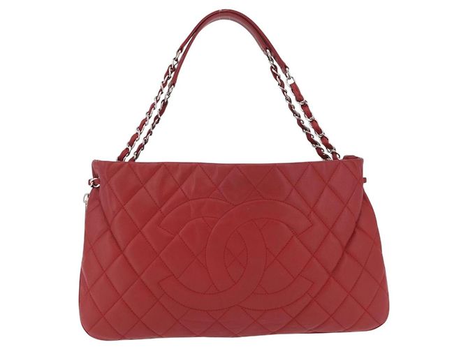 Classique Chanel Timeless CC Expandable Quilted Caviar Large Rouge