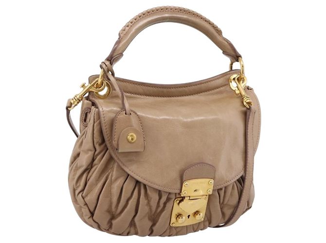 Bolsa Miu Miu Vitellolux Matelasse em couro 2way Rosa Tom Dourado Auth 207573V